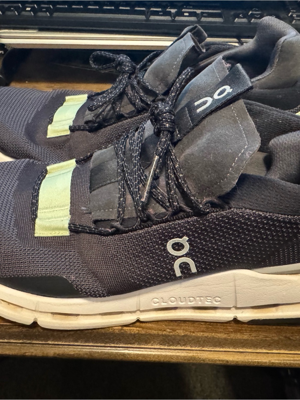 On Running Men's Black Athletic Sneakers with Light Green Accent